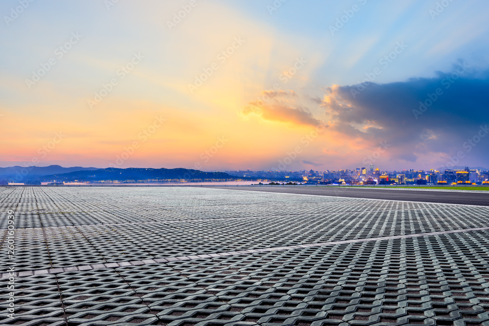 Empty square floor and beautiful city scenery with mountain in Hangzhou