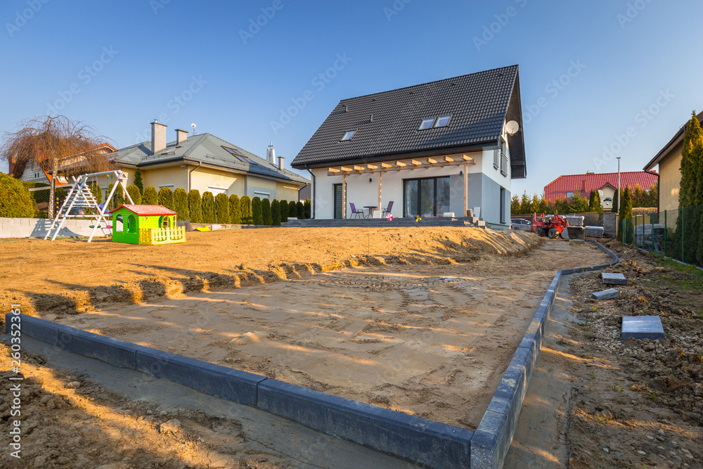 Concrete paver blocks laid near the house