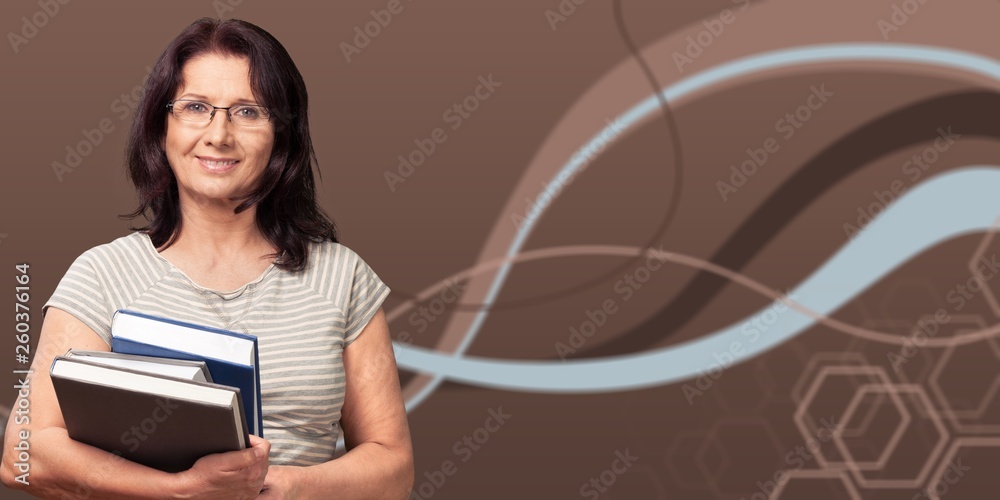 Woman with heap of books on blue background