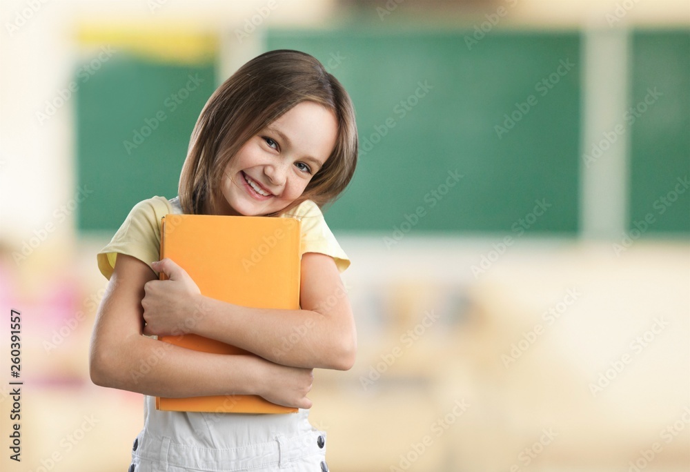 Pupil raising arm during the lesson, Education and school concept