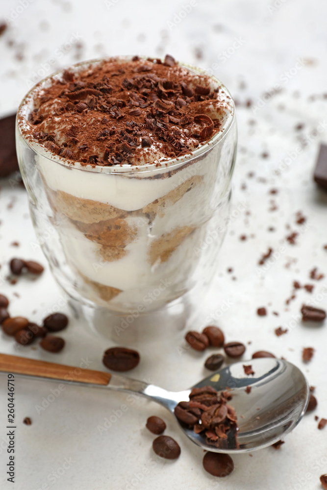 Tasty tiramisu on white table