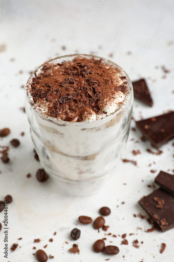 Tasty tiramisu on white table