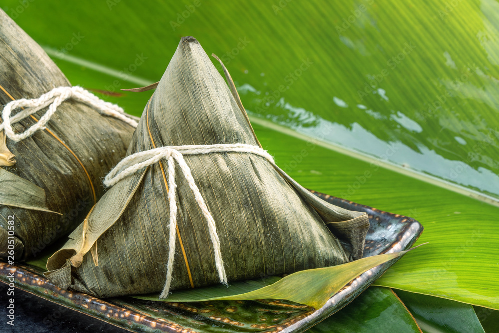 Close up, copy space, famous chinese food in dragon boat (duan wu) festival, steamed rice dumplings 