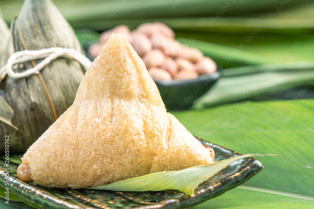 Close up, copy space, famous chinese food in dragon boat (duan wu) festival, steamed rice dumplings 