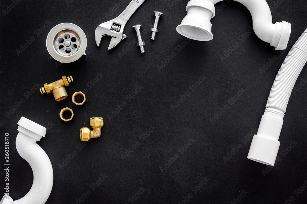 Plumber work with instruments, tools and gear on black background top view mock up