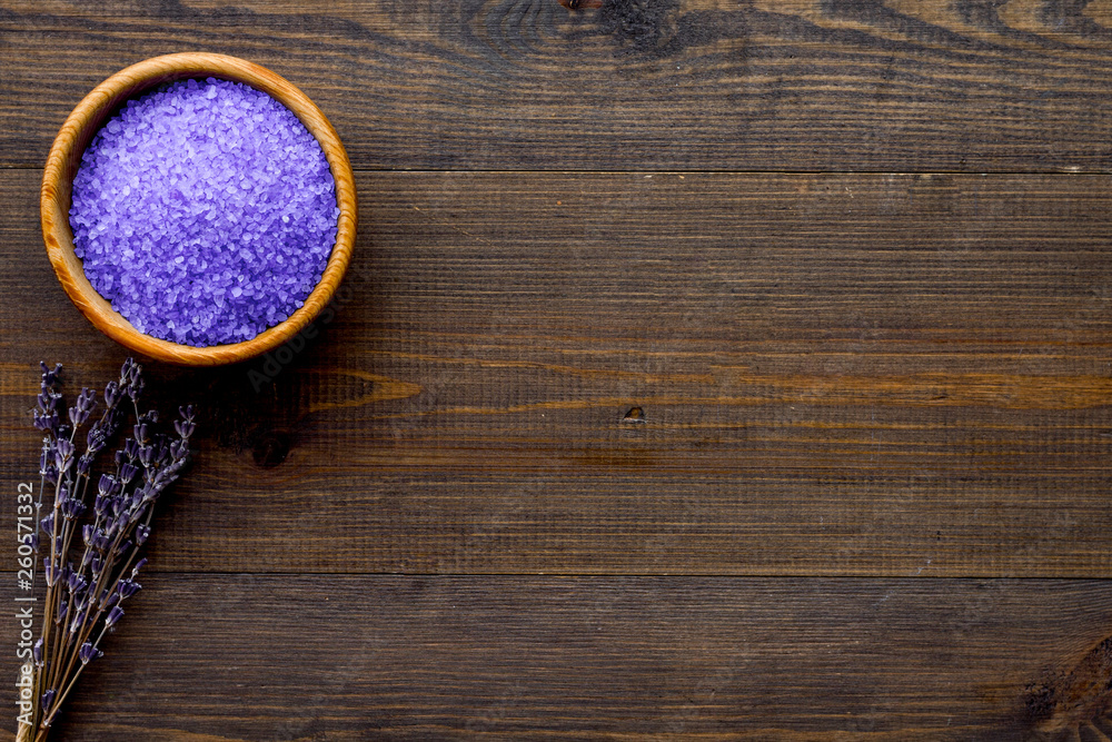 aroma therapy with lavender flower fragrance and spa salt on wooden background top view space for te