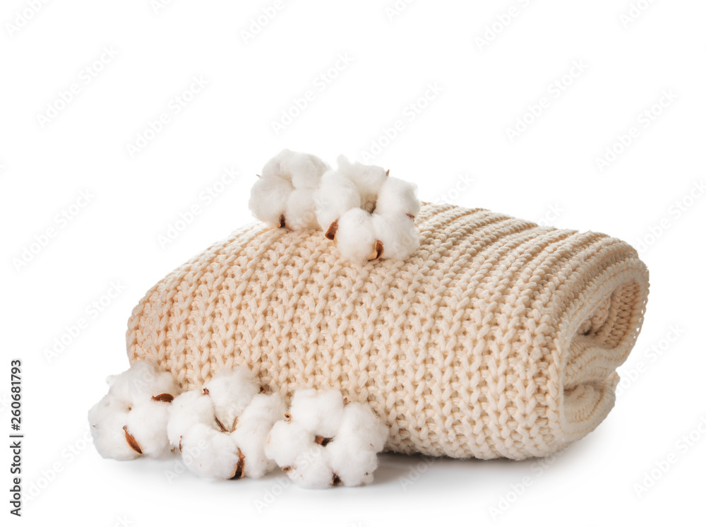 Cotton flowers with knitted sweater on white background