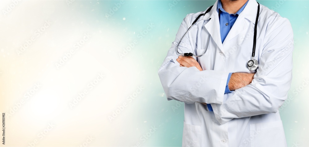 Portrait of doctor with stethoscope on blurred background