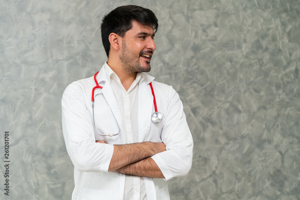 Young male doctor working at the hospital. Medical healthcare and doctor staff service.