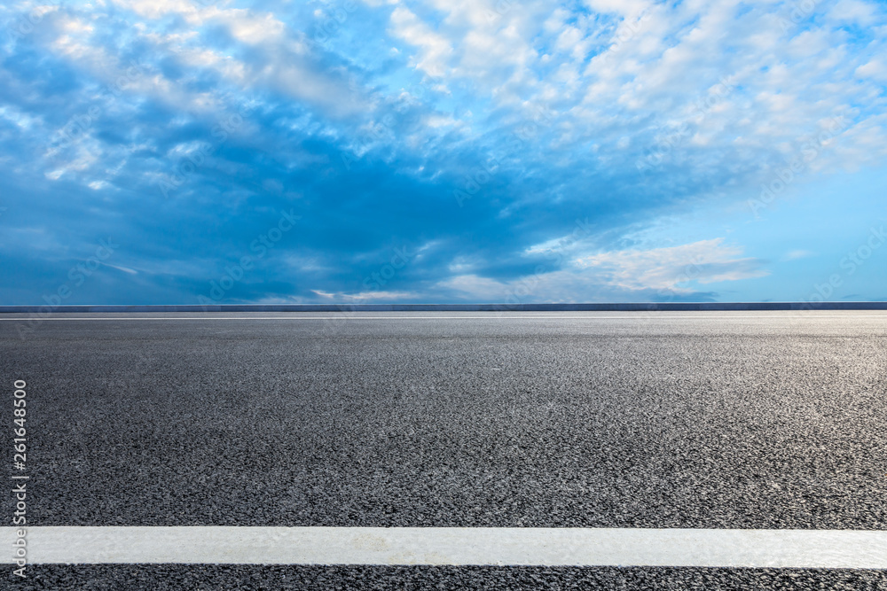 Empty asphalt road ground and blue sky with white clouds scene