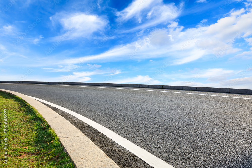 Empty asphalt road ground and blue sky with white clouds scene