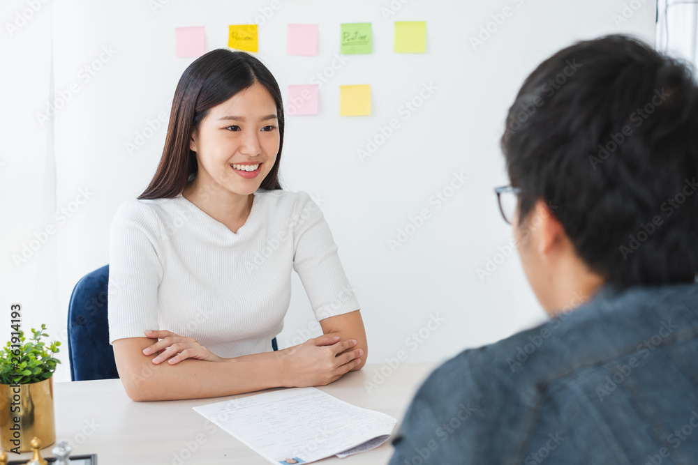 Asian business woman discussing/job interview with colleauge/boss for business meeting