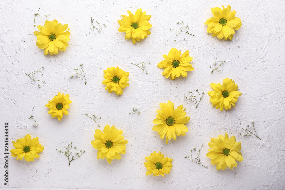 Beautiful flowers on white textured background