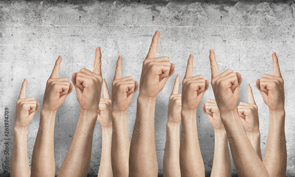 Row of man hands showing finger pointing gesture