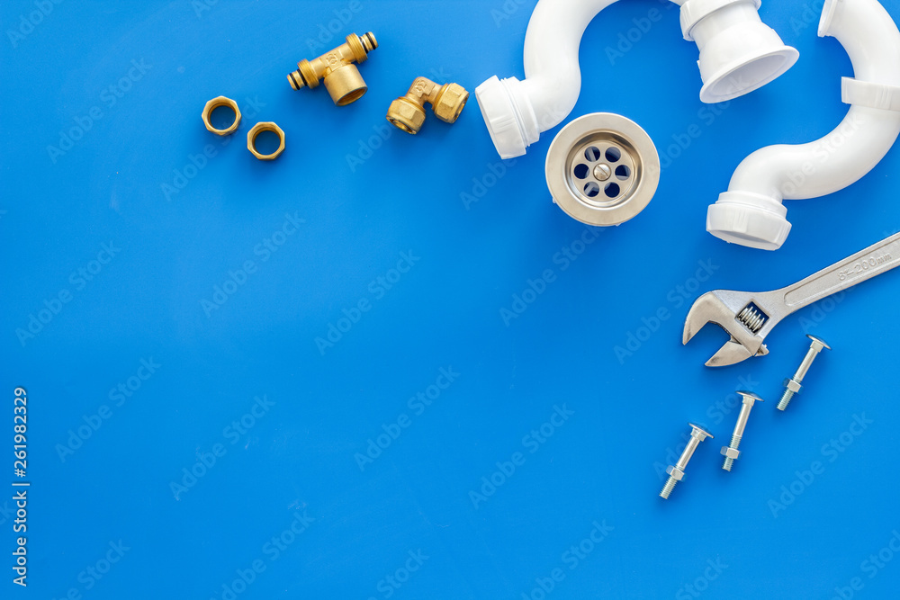 Plumber work with instruments, tools and gear on blue background top view mockup