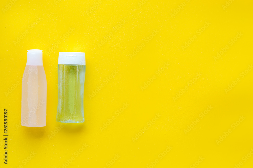 skin care cosmetics with facial tonic, mycelial water on yellow background top view mockup