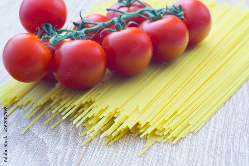 Raw tomatoes and pasta