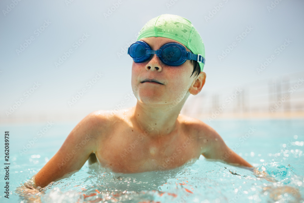 Boy learning to swim