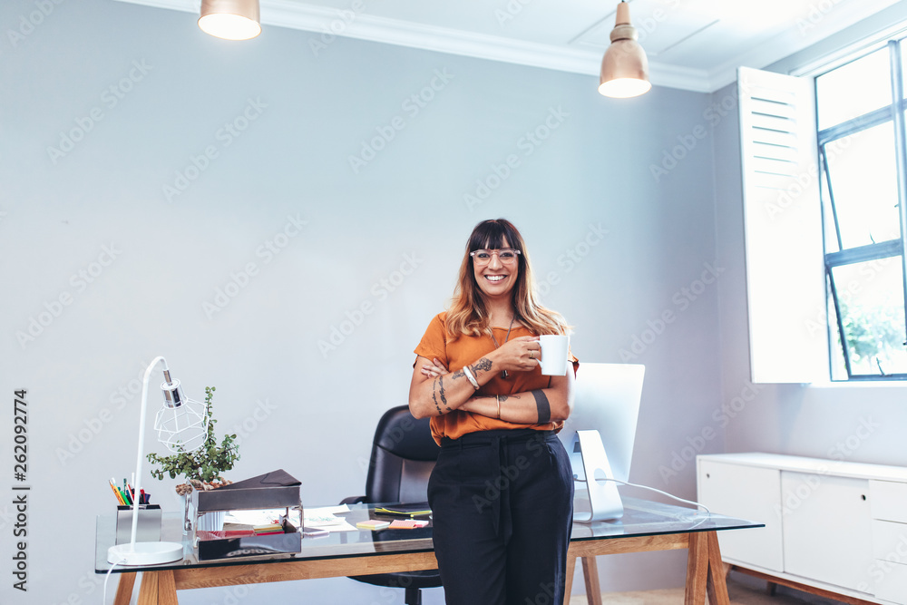 Portrait of a cheerful businesswoman in office