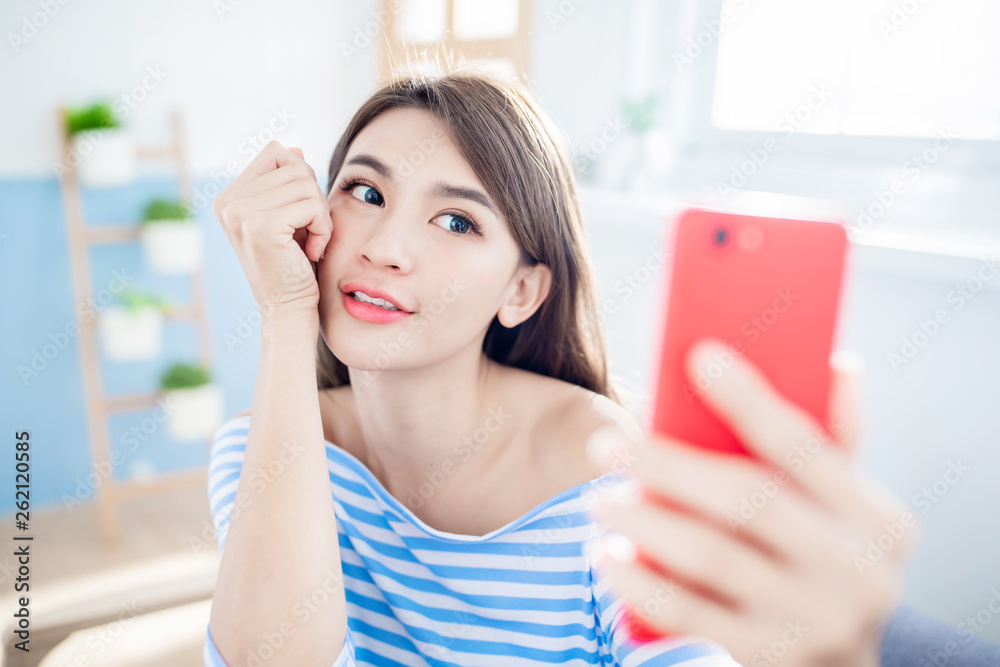 beautiful woman taking selfie