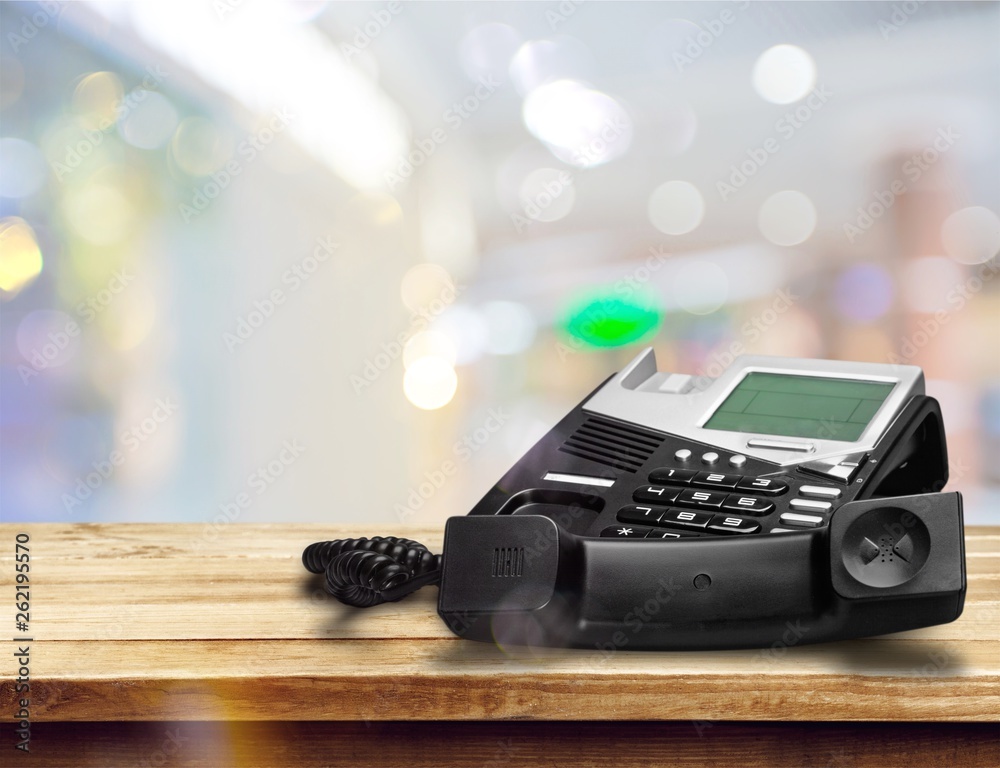 Old fashioned phone on desk