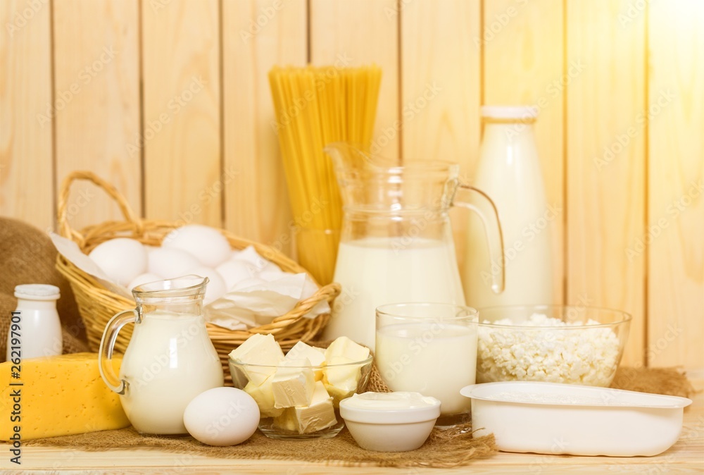 Dairy products collection on wooden table