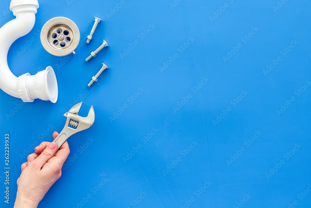 Plumber work with instruments, tools and gear on blue background top view mockup