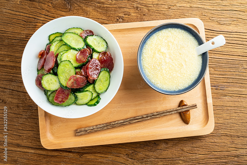 Cucumber fried sausage and millet porridge