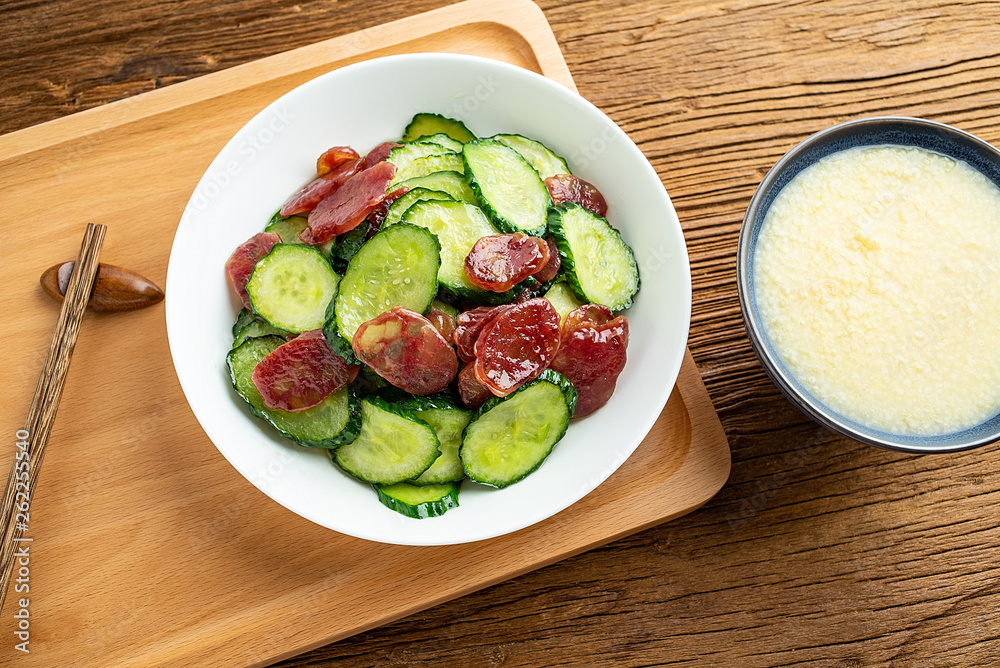 Cucumber fried sausage and millet porridge