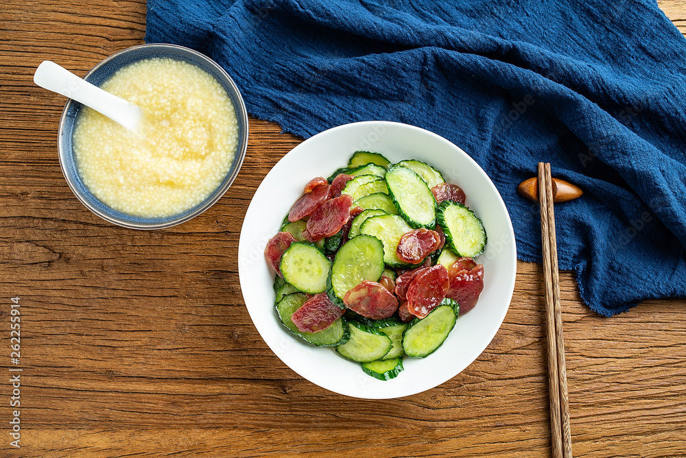 Cucumber fried sausage and millet porridge