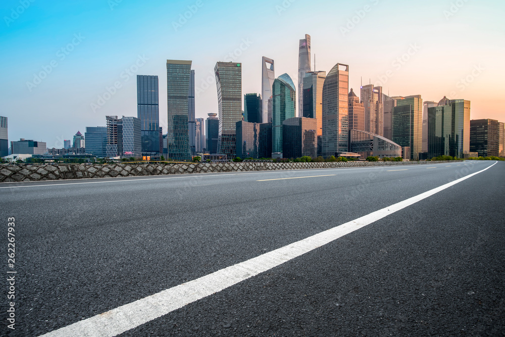 Empty Asphalt Road Through Modern City of Shanghai, China..