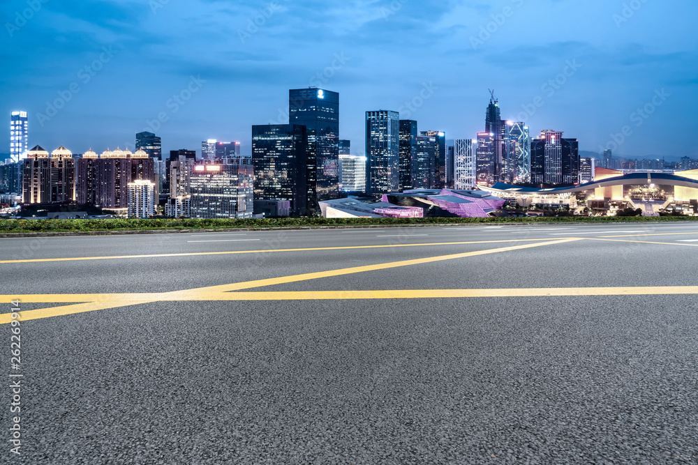 Road and skyline of urban architecture..