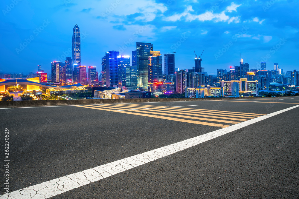 Road and skyline of urban architecture..