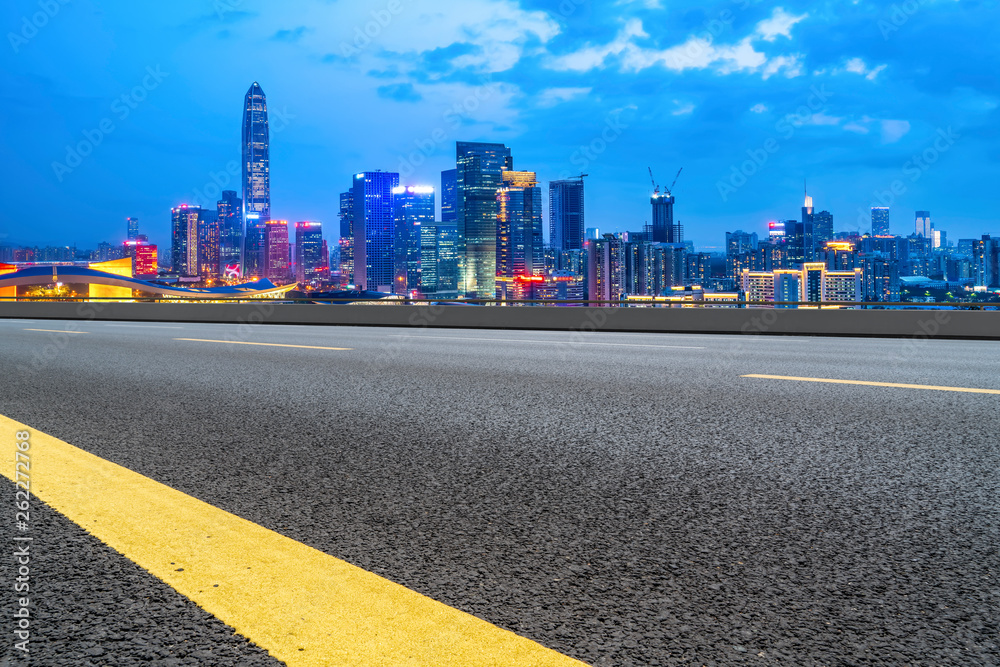 Road and skyline of urban architecture..