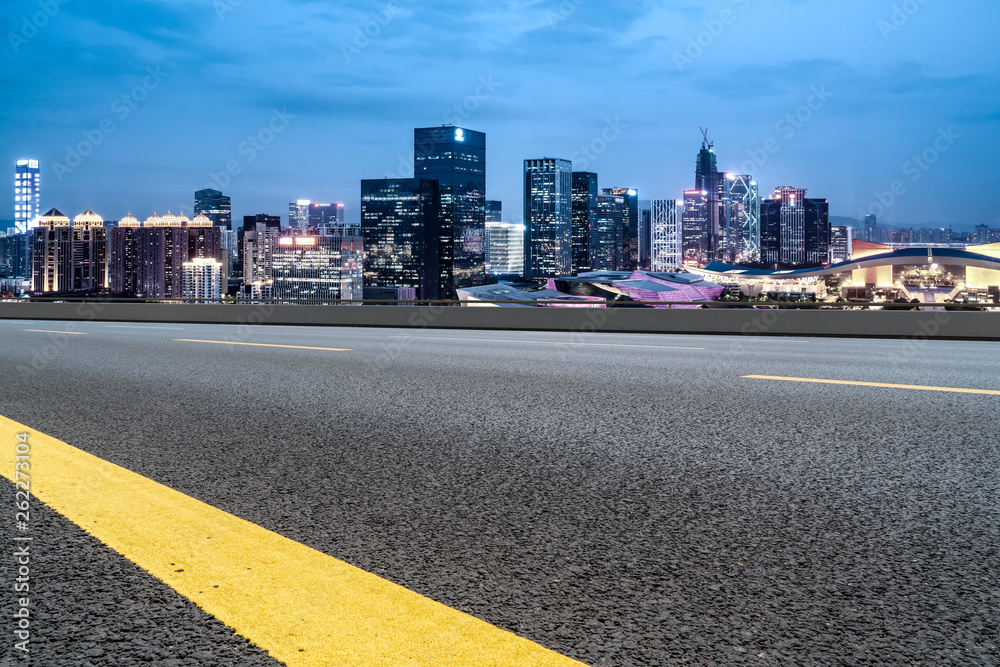 Road and skyline of urban architecture..