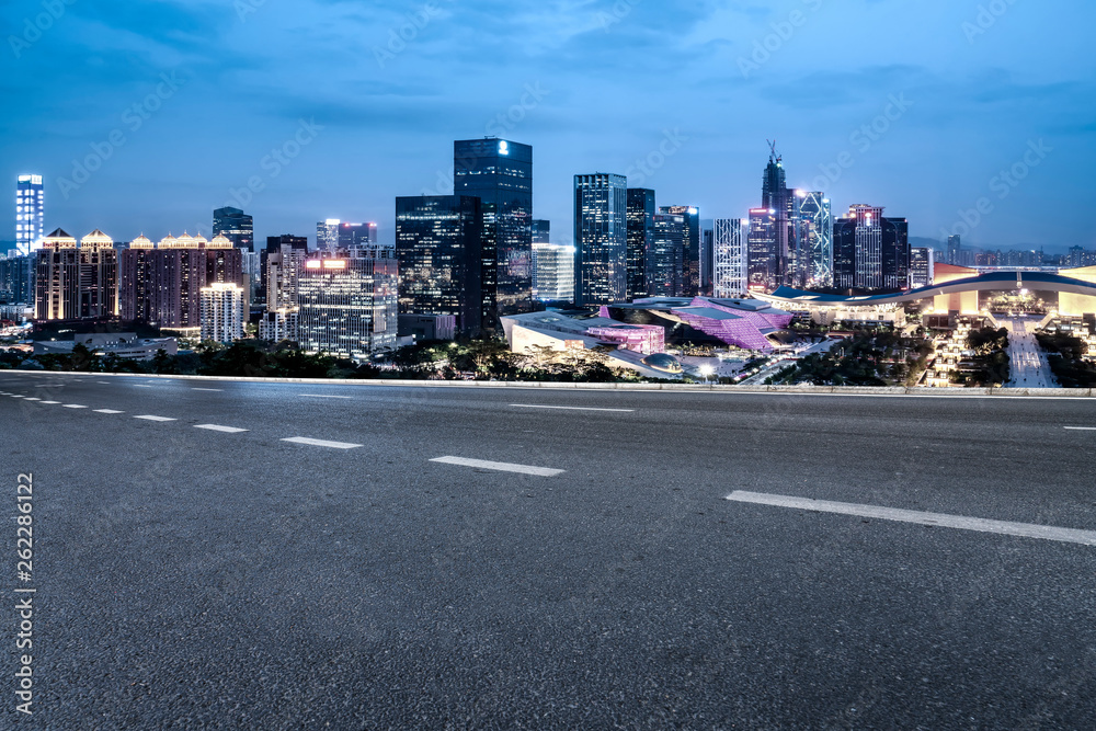 Road and skyline of urban architecture..