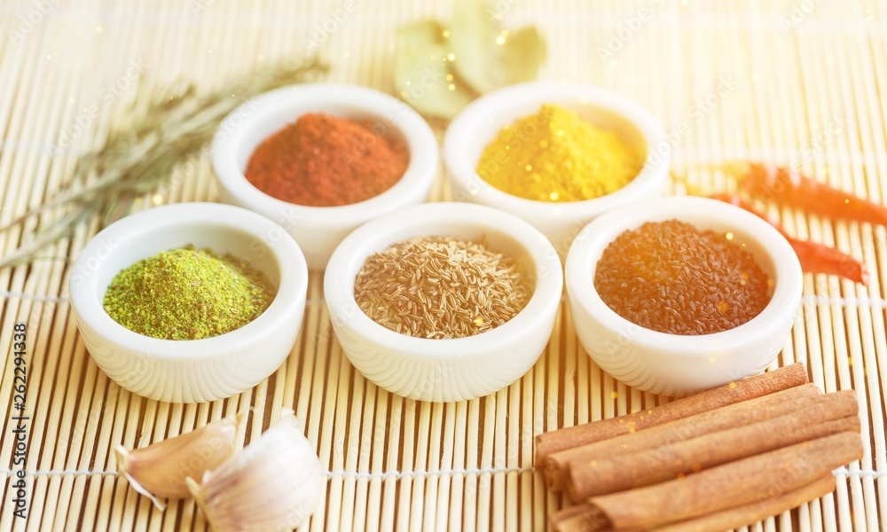 Spices and herbs in  bowls. Food and cuisine ingredients.