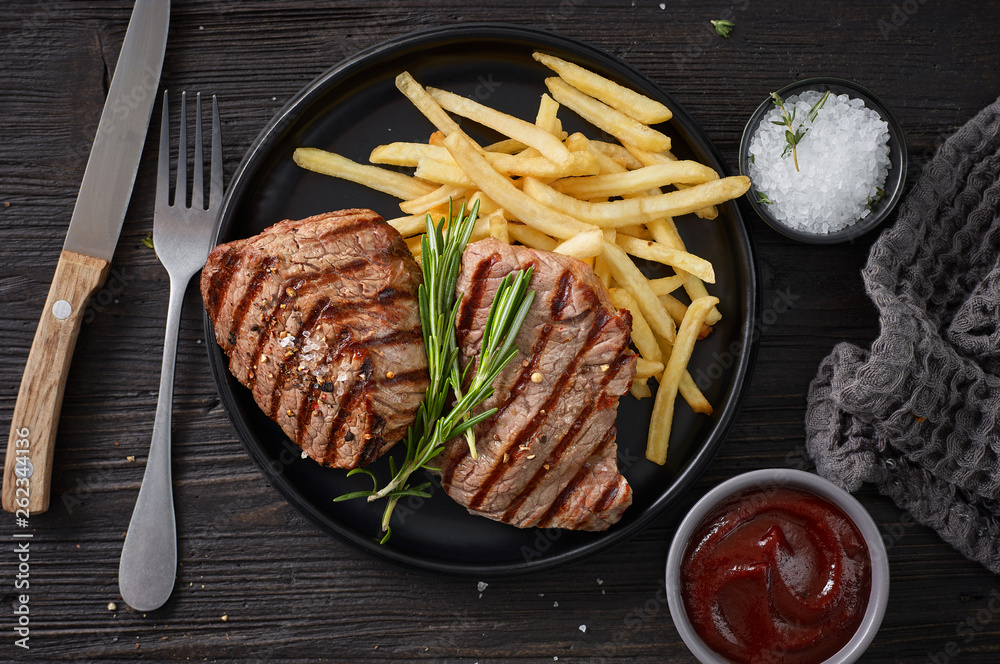 grilled steak and fried potatoes