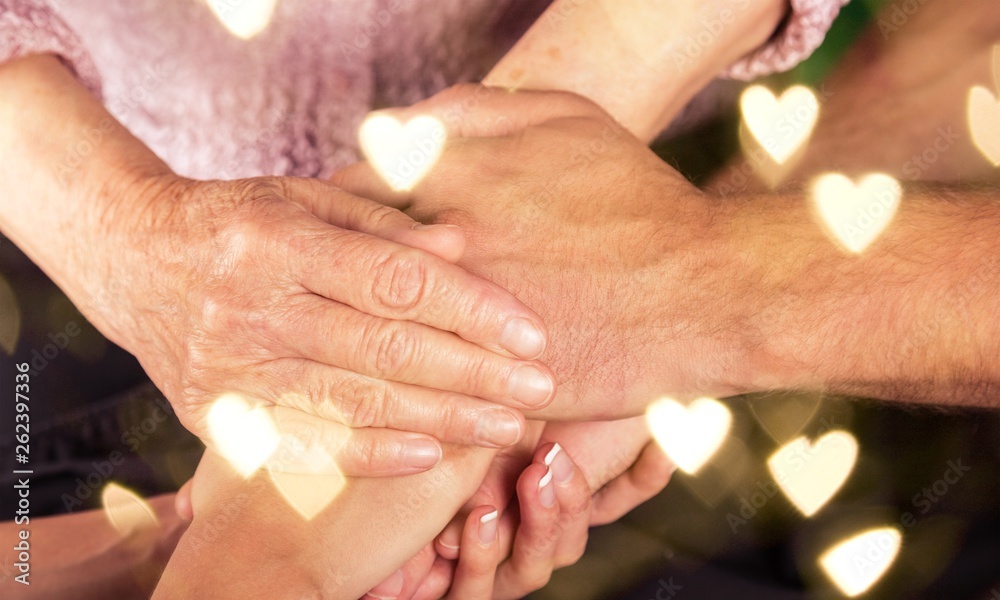 Man and Woman Hands Holding an Old Womans Hands