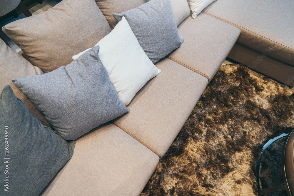 contemporary interior of Living room with part of sofa in sunny day and white curtain interior backg