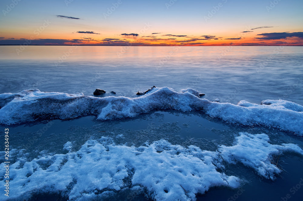 Snow what in lakeside sunset.