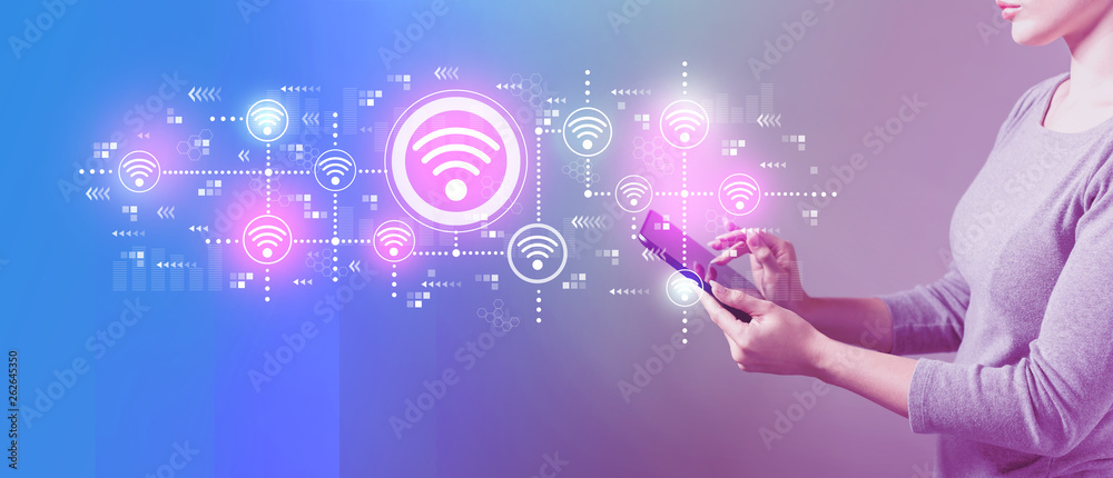 Wifi concept with business woman using a tablet computer 