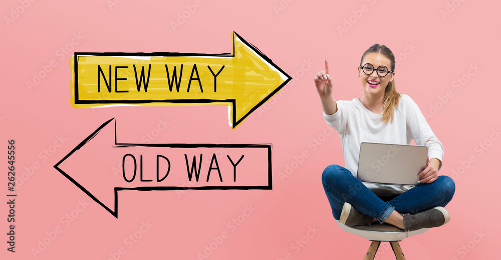 Old way or new way with young woman using her laptop