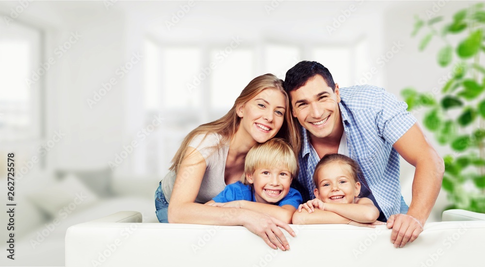 Beautiful smiling family on background