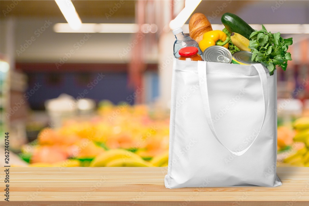 Full shopping  bag, isolated over  background