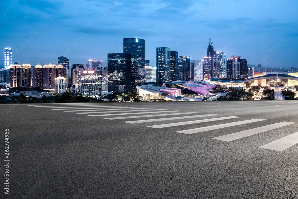 Road and skyline of urban architecture..