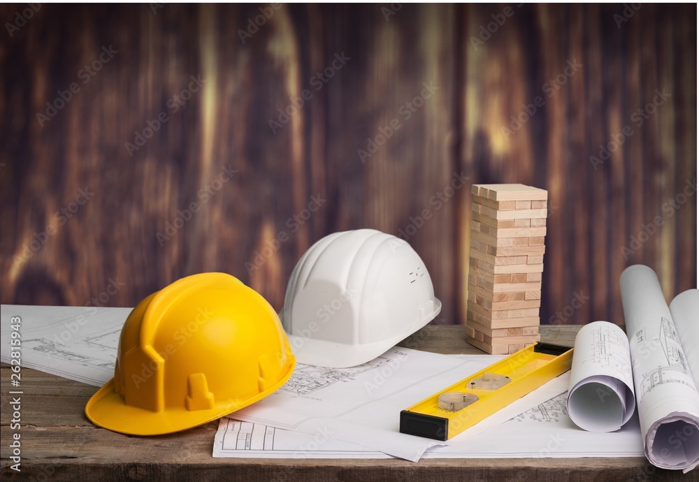 Yellow helmet with equipment on  background