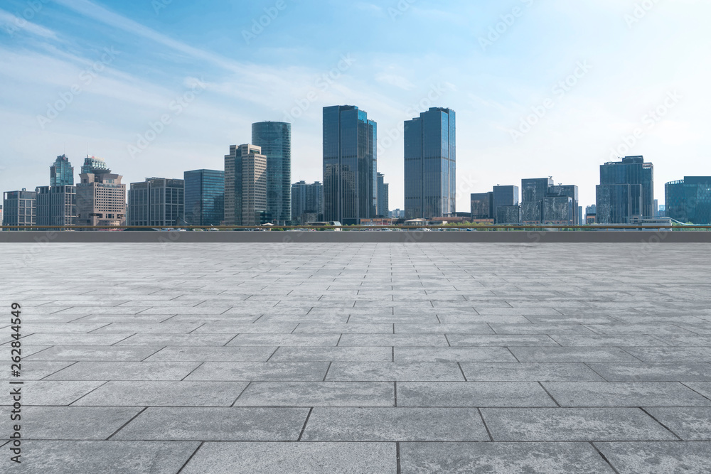 Plaza tiles and skyline of urban Architecture