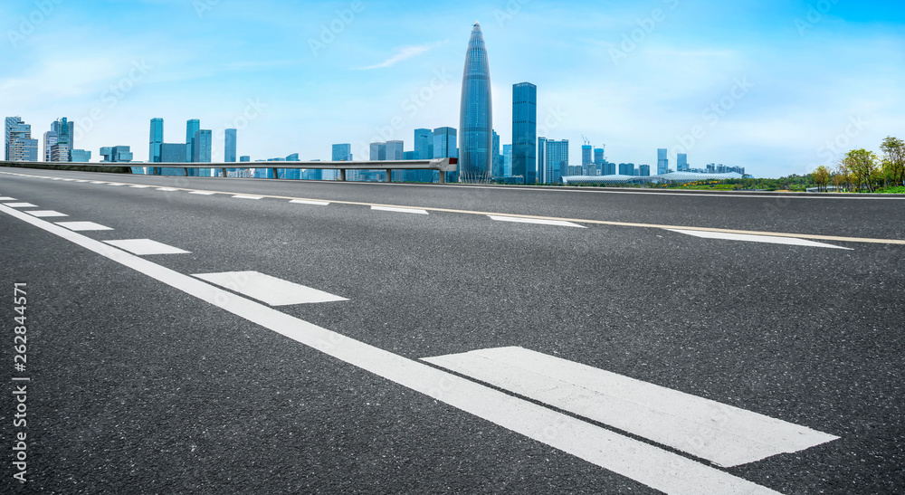 Road and skyline of urban architecture..