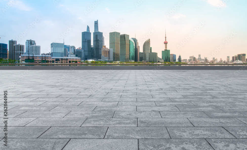 Urban skyscrapers with empty square floor tiles